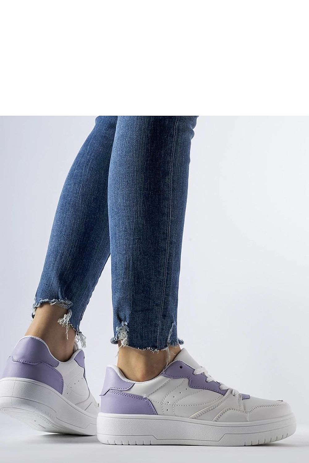 Elegant white sneakers with purple accents by Solea, showcasing their eco leather design, perfect for summer styling.