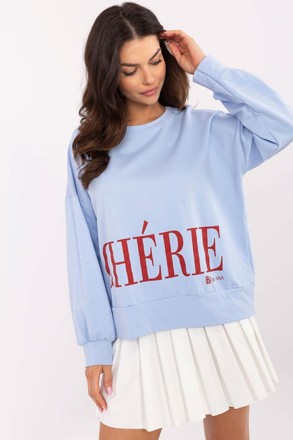 Flat lay arrangement of Italy Moda Women’s Cotton-Blend Sweatshirt, featuring its luxurious fabric blend and fashionable inscription.