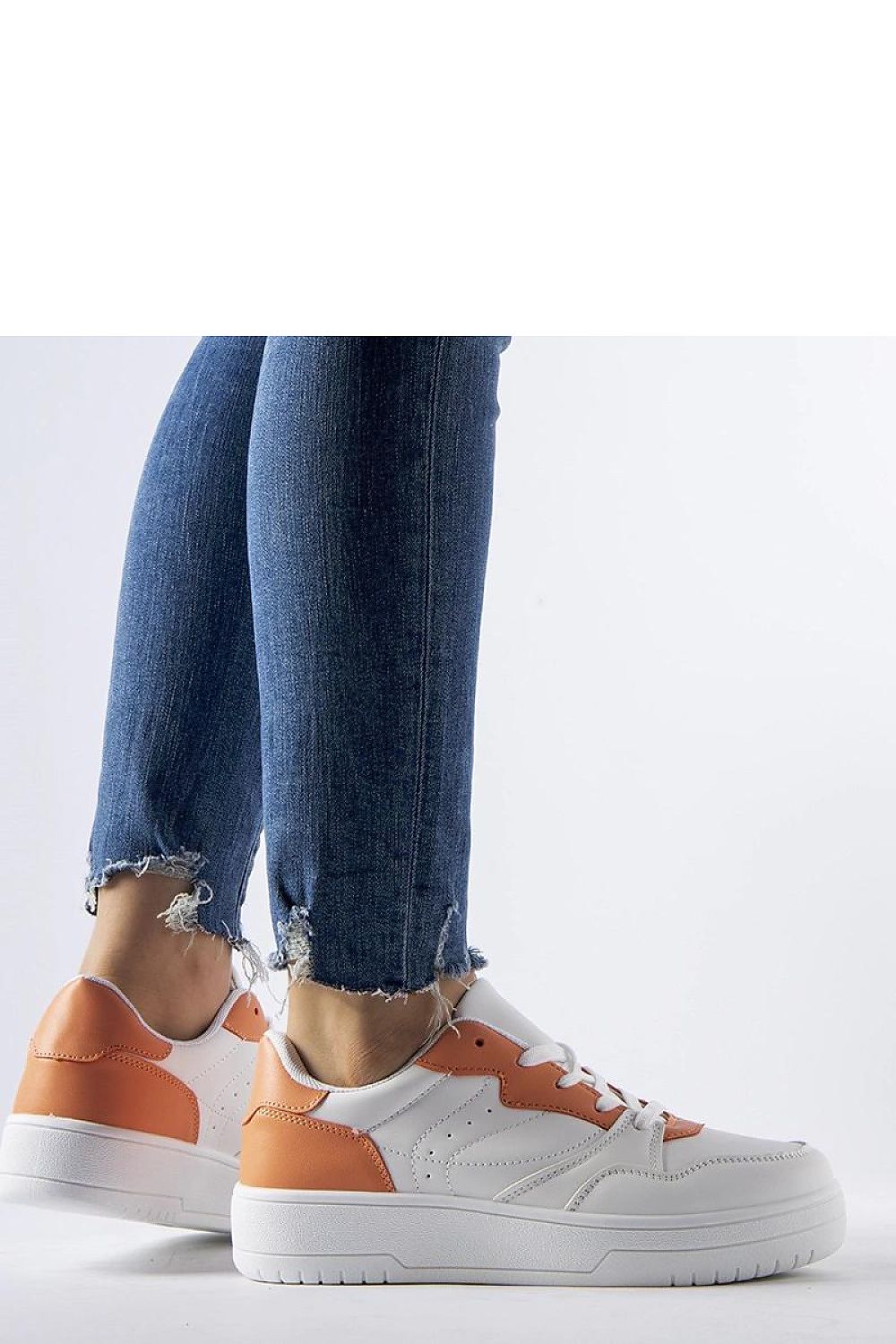 Stylish purple-accented white sneakers from Solea, featuring durable rubber sole and breathable synthetic suede, perfect for fashionable summer outfits.