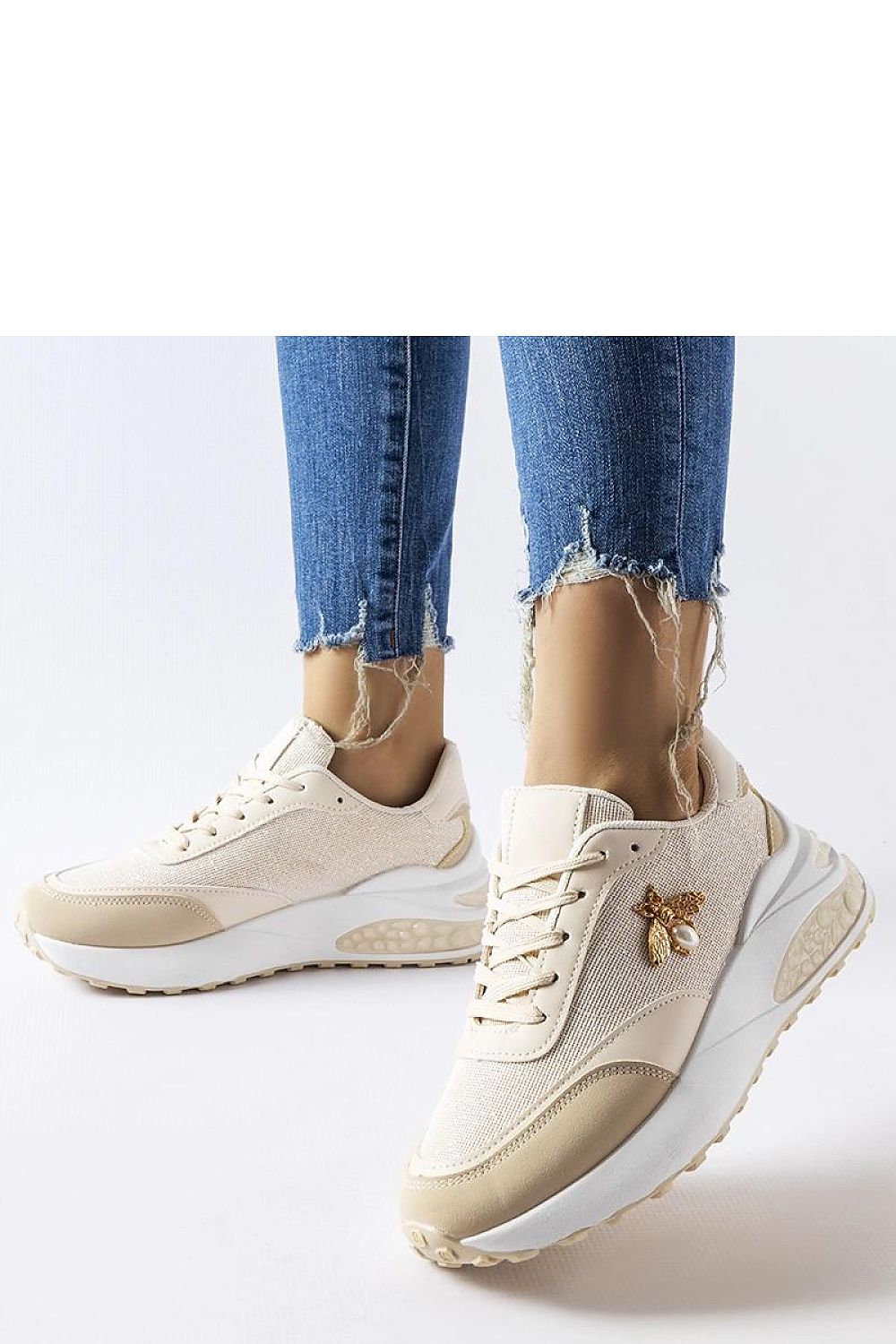 Close-up view of Solea Acciano Eco-Leather Sneakers' decorative stitching, reflecting on the exquisite craftsmanship and luxury of the footwear.