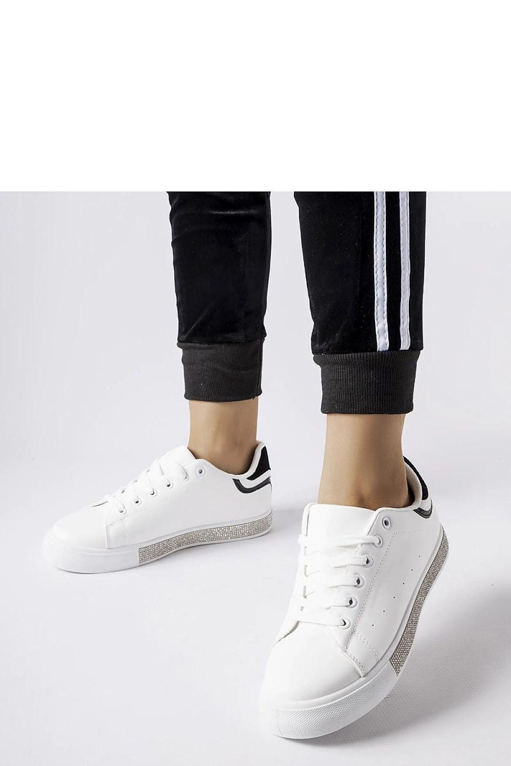 Solea black and white sneakers with zircons, showcasing modern design and elegance, perfect for stylish women.