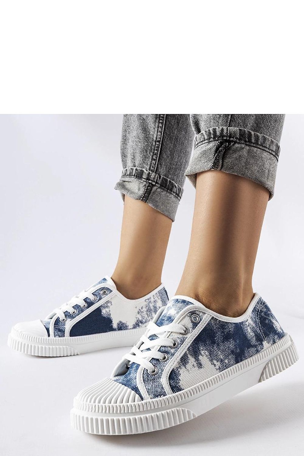 Stylish Clavet women's blue sneakers with a fading effect, showcasing their modern design and round toe, perfect for summer walks.