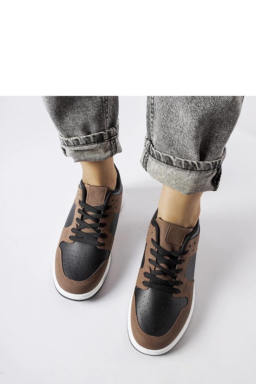 Side view of Jacqueline Eco-Leather Sneakers for women in sophisticated brown and black by Solea, emphasizing their versatility for both everyday and formal occasions.