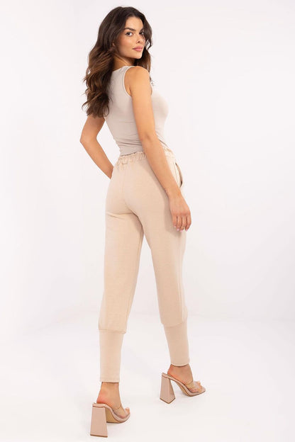 Luxurious Italy Moda high waist track pants showcasing a modern design, perfect for casual wear and sporty outfits.