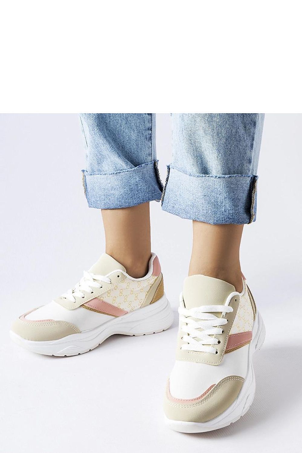 Luxurious Solea beige and white eco leather sneakers adorned with gold accents, showcasing the perfect blend of style and comfort for discerning fashion enthusiasts.