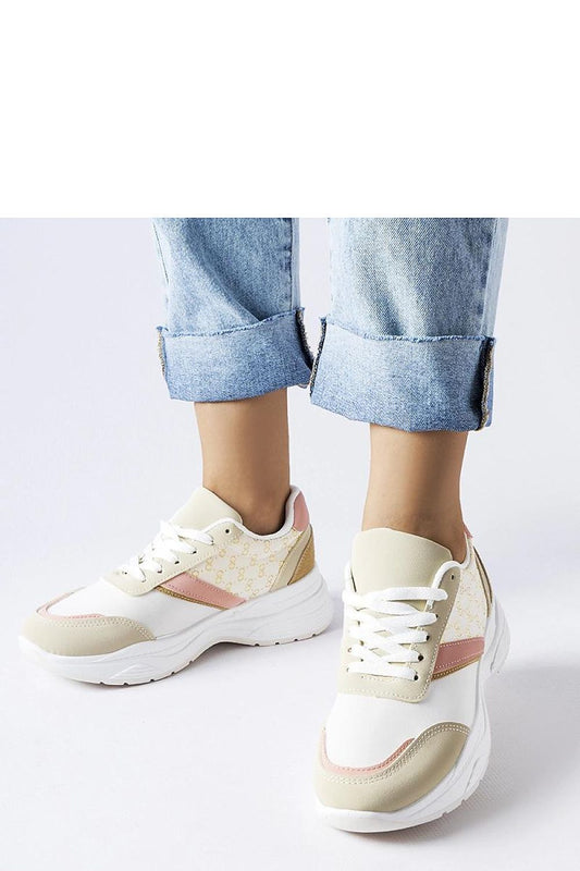 Luxurious Solea beige and white eco leather sneakers adorned with gold accents, showcasing the perfect blend of style and comfort for discerning fashion enthusiasts.