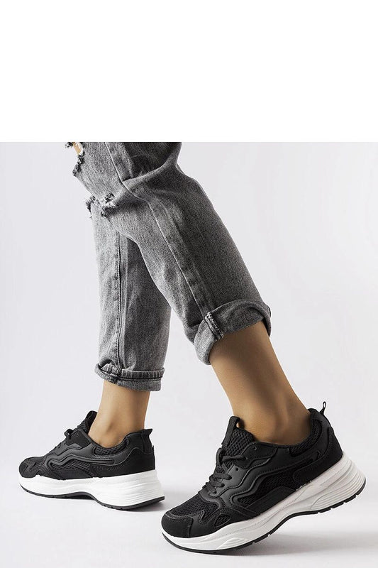 Luxury black sports sneakers designed by Solea, crafted from high-quality synthetic leather, perfect for elegant style and comfort. Ideal for warm weather with a laced closure for a snug fit.