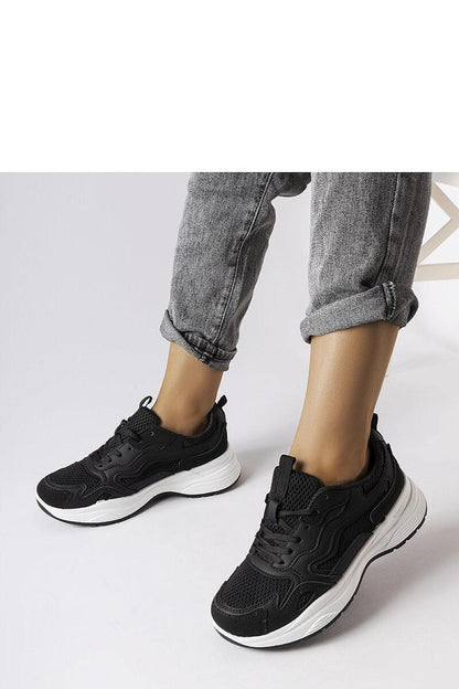 Luxury black sports sneakers by Solea showcasing high-quality synthetic leather and a stylish design, perfect for comfort and durability during everyday wear and sports activities.