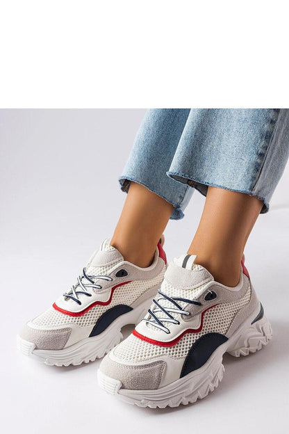 Stylish display of Solea White Rosita Sneakers, highlighting the trendy design and universal white colour, perfect for modern women's wardrobes.