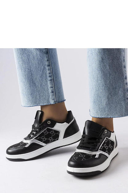 Solea white Isidora sneakers displayed on a chic surface, demonstrating a low-cut design ideal for everyday wear during summer.