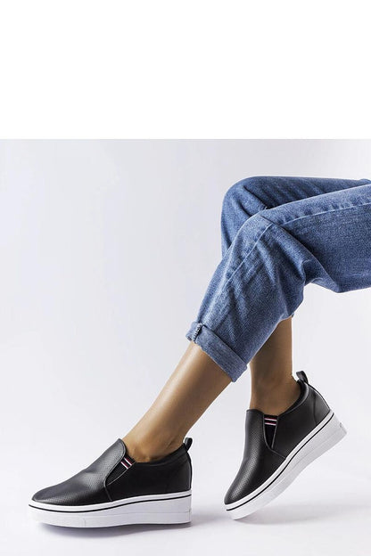 Close-up of Dionisia Black Eco Leather Wedge Sneakers by Solea, showcasing their modern design and eco-friendly materials, ideal for women seeking luxurious comfort.