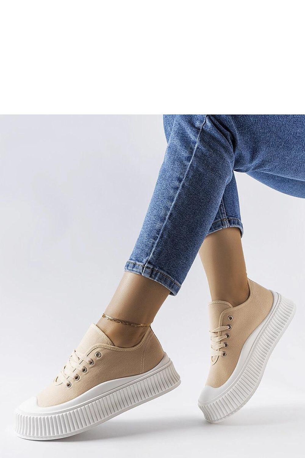 Chic beige platform sneakers from Solea, showcasing a trendy design that complements summer dresses and casual wear.