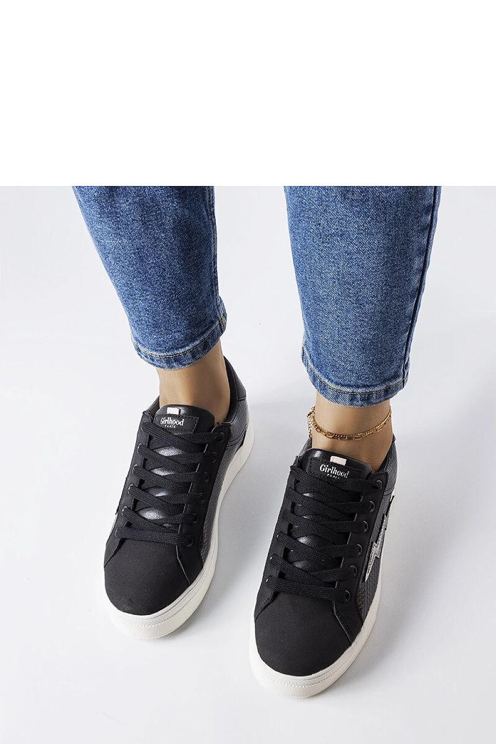 Close-up of Solea black Vernadeau sneakers highlighting the luxurious eco leather texture and fashionable thicker sole, designed for ultimate comfort and style.