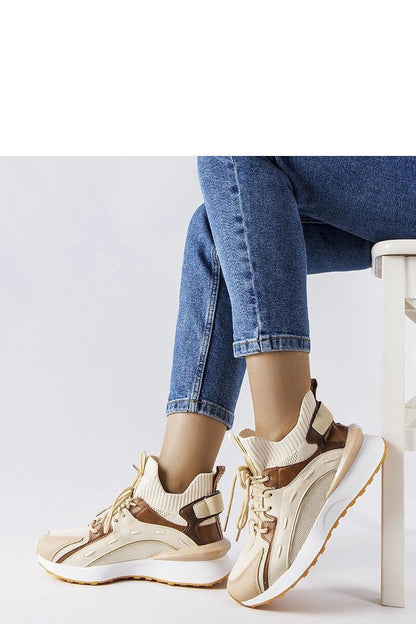 Close-up view of Solea Women's Beige Sports Sneakers, highlighting high-quality rubber material and modern pattern for fashion-forward footwear.