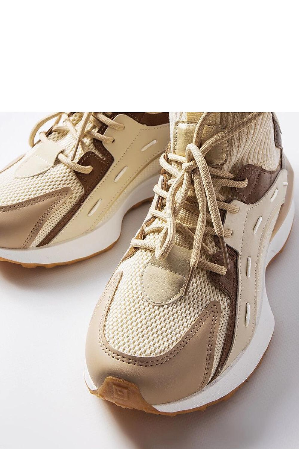 Solea Women's Beige Sports Sneakers shown from the side, featuring a round toe and laced closure for stability during physical activities.