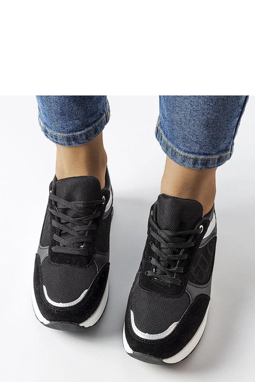 Solea's exquisite black lace-up sneakers showcasing a black rubber sole, providing both elegance and comfort for the discerning individual.