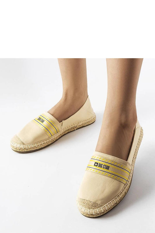 Close-up of Solea’s luxury beige espadrilles, featuring high-quality fabric and breathable design, ideal for warm weather.