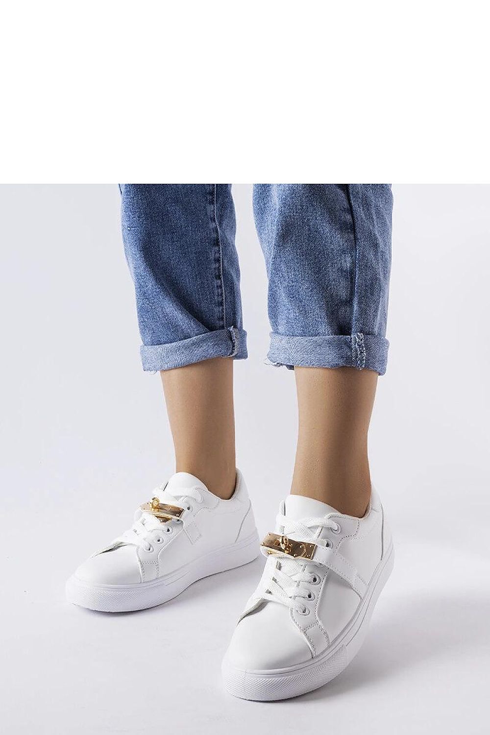 Solea's chic white sneakers in eco-leather with stylish gold accent, offering comfort and elegance for casual or dressy occasions.