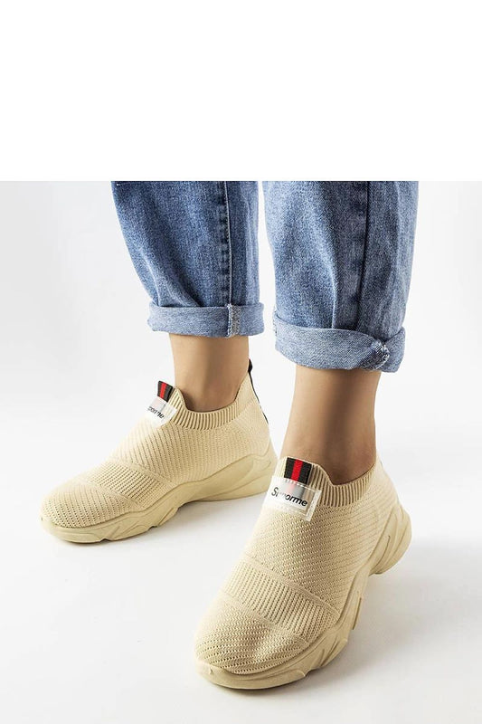 Luxury beige slip-on women’s sports shoes by Solea, ideal for summer comfort and style, featuring a rubber sole and elegant design.