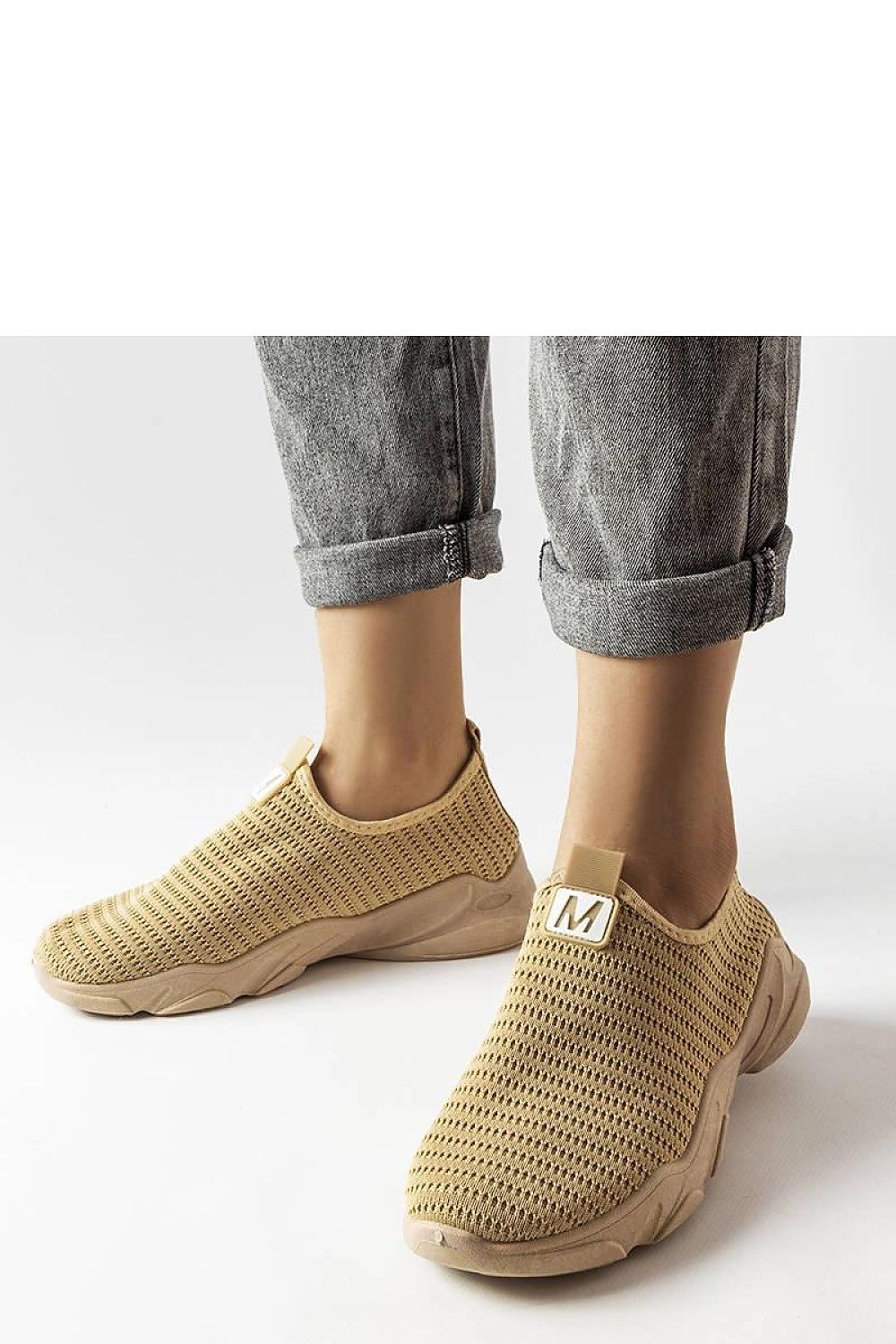 Solea women's elegant dark beige slip-on sports shoes displayed elegantly, showcasing the lightweight fabric and breathable design, perfect for summer styles.
