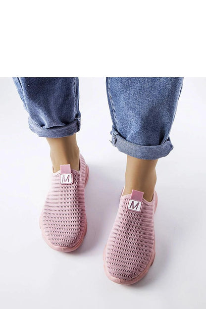 Luxury design of Solea Pink Slip-On Sports Shoes showcasing durable fabric and fashionable slip-on closure, tailored for active women, ideal for warm weather.