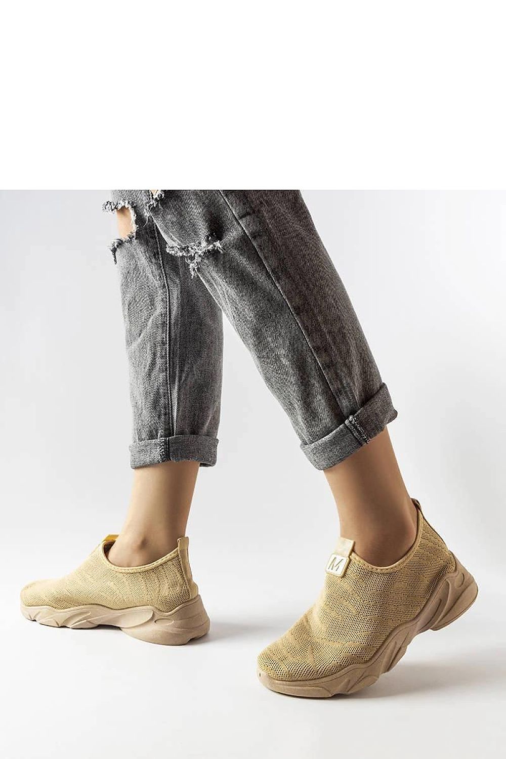 Close-up view of Solea Women's Sport Shoes in Dark Beige, featuring high-quality fabric and a stylish design, perfect for active women who appreciate sophistication.