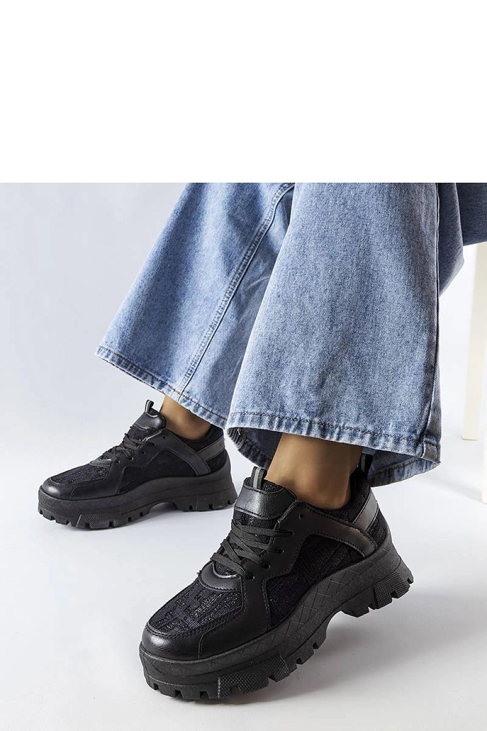 Detail of Solea Brunswick eco-leather chunky sneakers, featuring a round toe and lace-up design ideal for chic summer outfits.