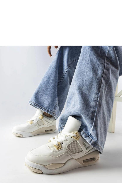 Close-up view of Solea's luxury beige Malas sneakers, featuring a comfortable low upper and stylish white rubber sole.