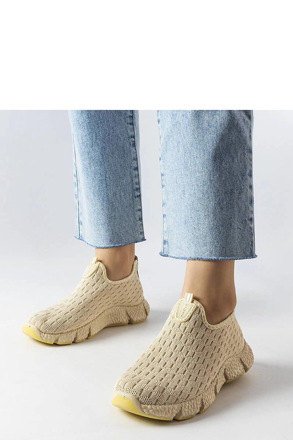 Elegant light beige slip-on sporty sneakers for women from Solea, showcasing high-quality fabric and a stylish low profile design, perfect for summer casual outfits.