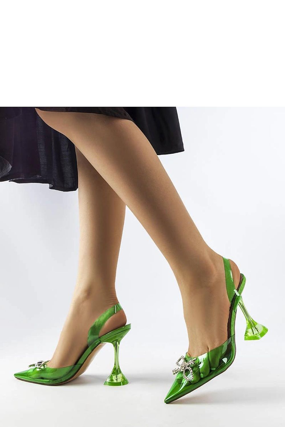 Solea Green Transparent High Heel Pumps paired with chic summer attire, perfect for upscale occasions.