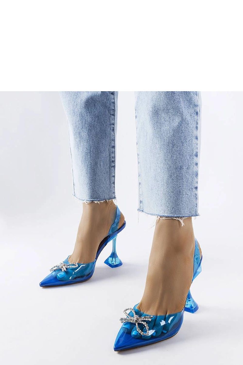 Solea Green Transparent High Heel Pumps displayed against a stylish summer background, exuding luxury and sophistication.