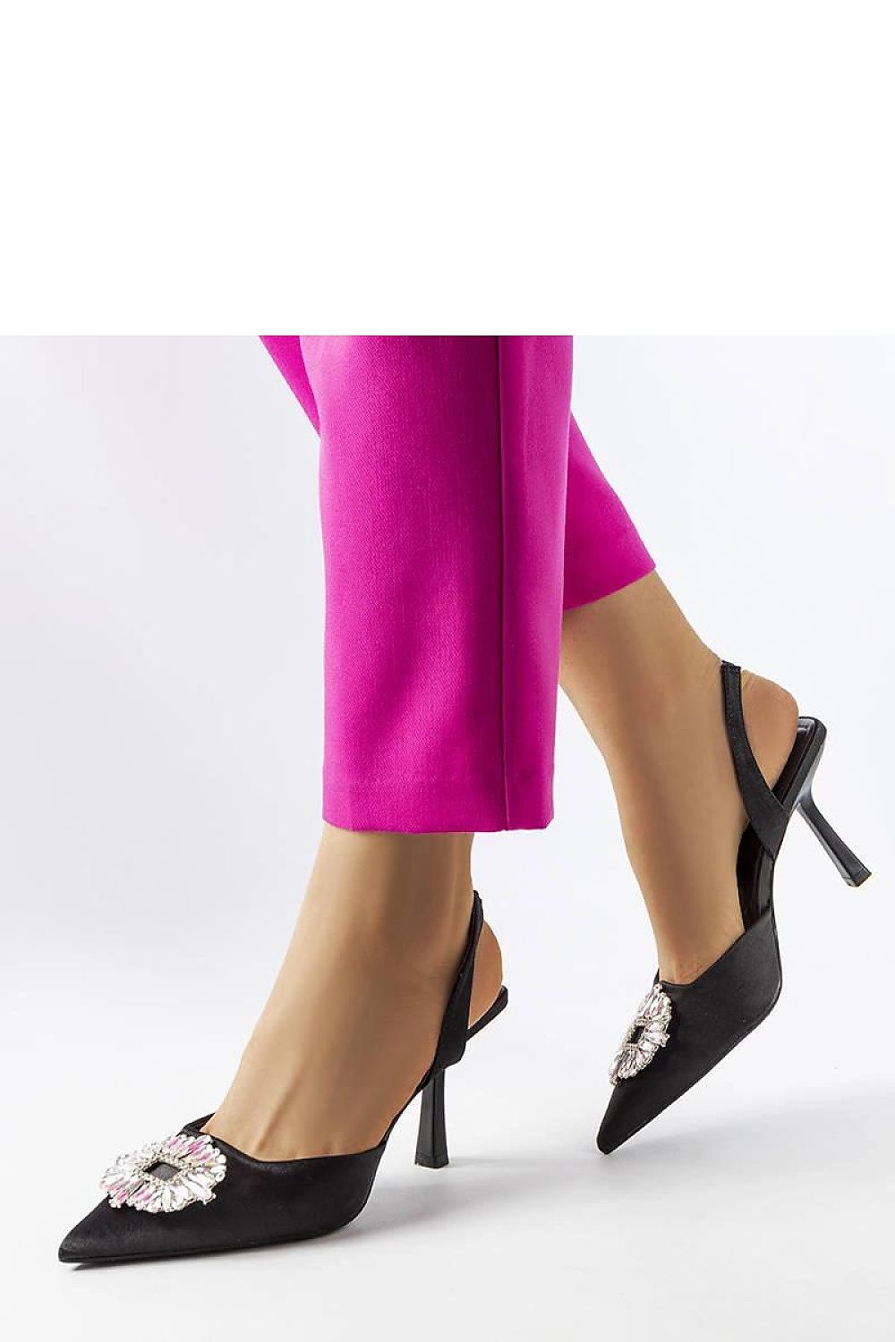 Close-up of Solea's chic black high heel pumps adorned with sparkling zircons, exemplifying style and elegance in footwear.