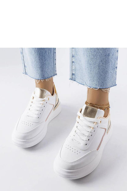 Solea summer sneakers in pristine white with beige accents, displaying a versatile and comfortable style suitable for various outfits in warm weather.
