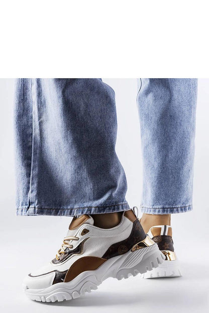 Solea white sneakers displayed against a minimalist backdrop, highlighting the perfect blend of style, comfort, and high-quality design.