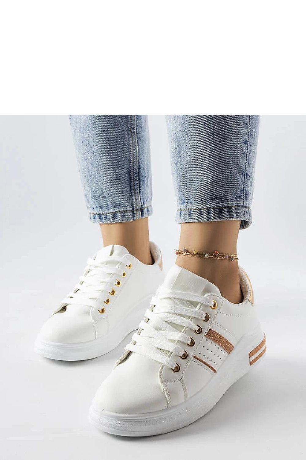Luxury white platform sneakers by Solea featuring a low lace-up design, perfect for summer fashion. Ideal for both casual and evening wear.
