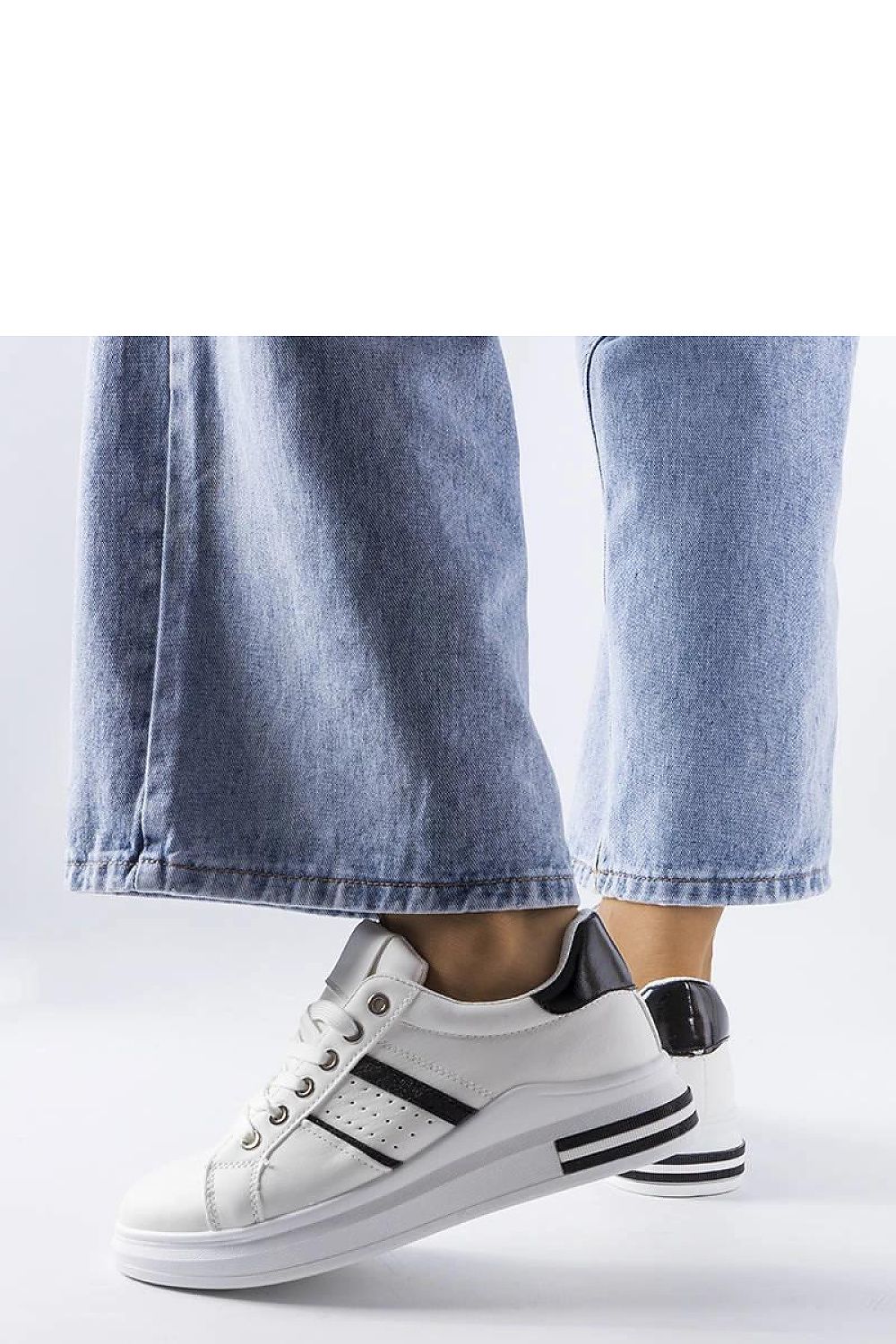 Back view of luxury white platform sneakers by Solea, designed for durability and sophistication in summer wear.