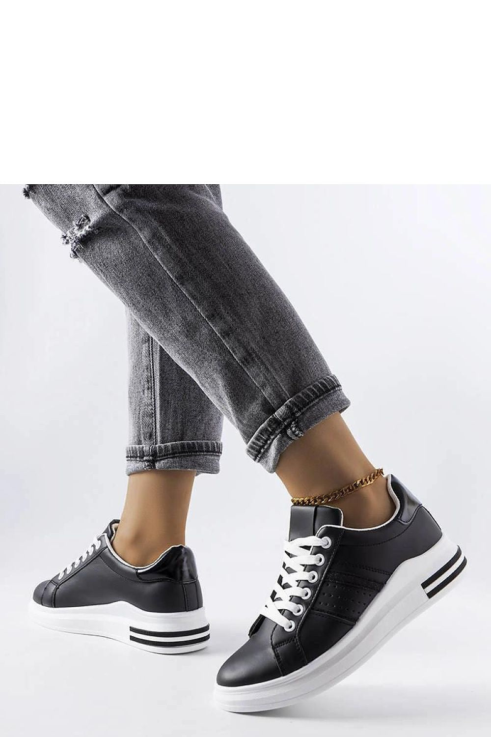 Lifestyle image of Solea luxury white platform sneakers, ideal for both casual outings and sophisticated summer styles.