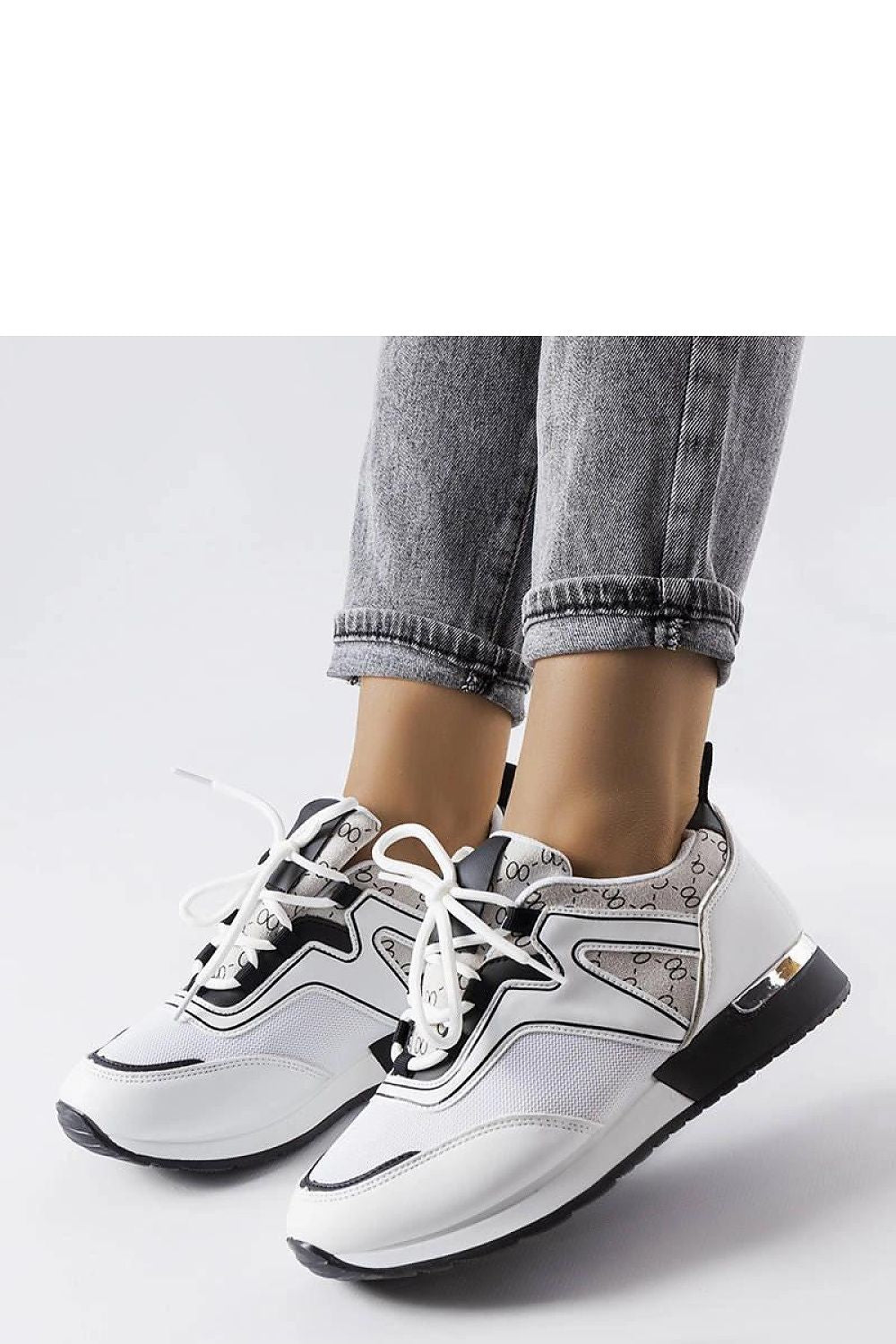 Solea luxury white Bedford sneakers showcasing a lace-up closure and a chic white rubber sole, perfect for fashionable comfort.