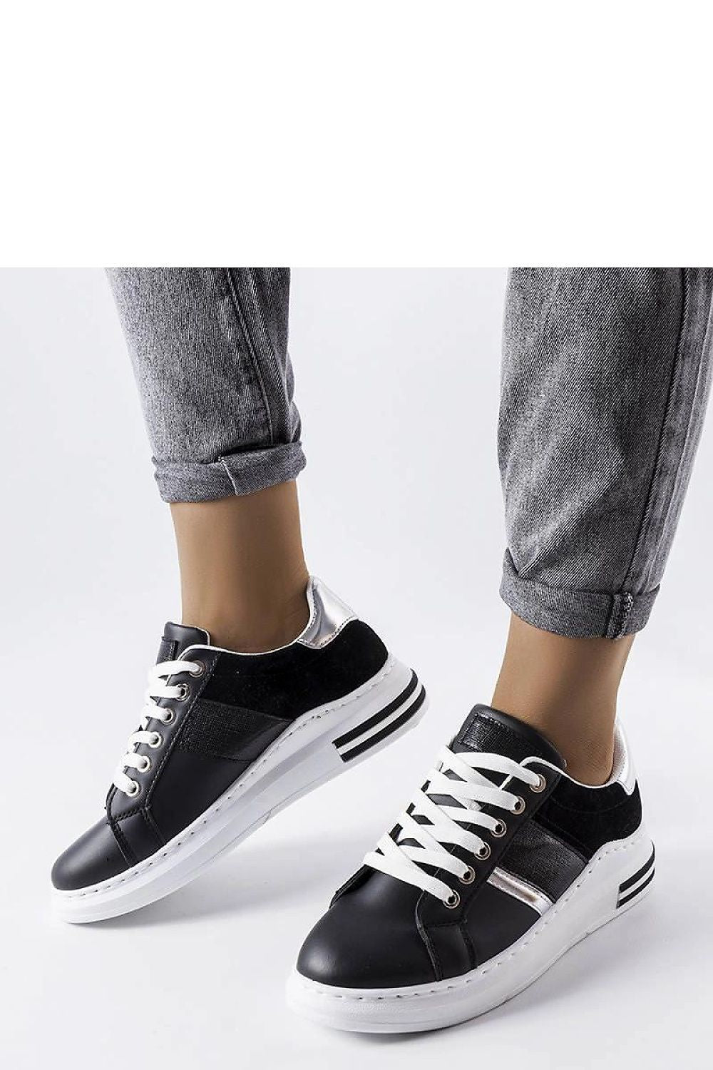 Solea luxurious women's white sneakers with pink inserts showcasing modern design and comfort.