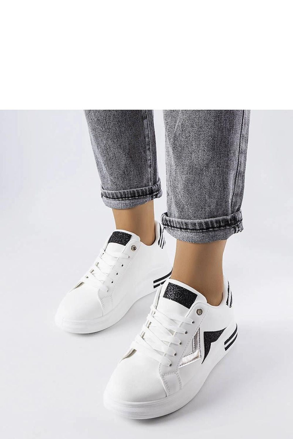 Solea luxury women's white and black platform sneakers, showcasing a trendy low model design perfect for summer fashion.