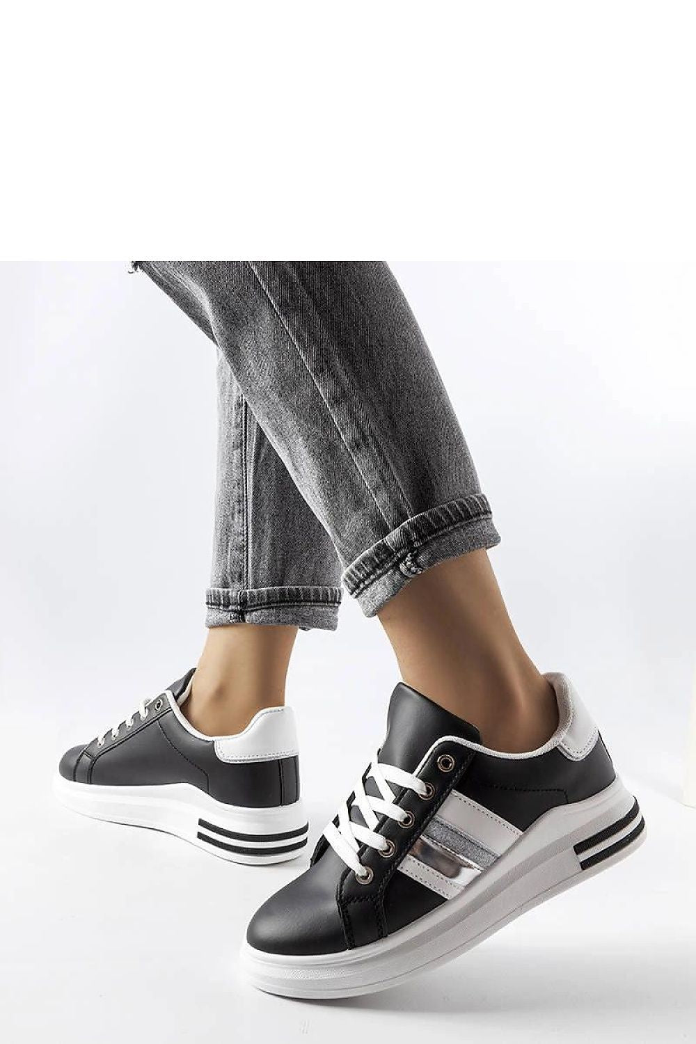 Elegant Solea Black and White Platform Sneakers featuring a 4 cm heel, round toe, and front lacing for a chic and comfortable fit, ideal for summer fashion.