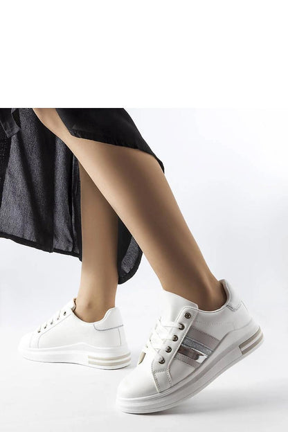 Solea Black and White Platform Sneakers displayed on a chic surface, highlighting their fashionable appeal and comfort.