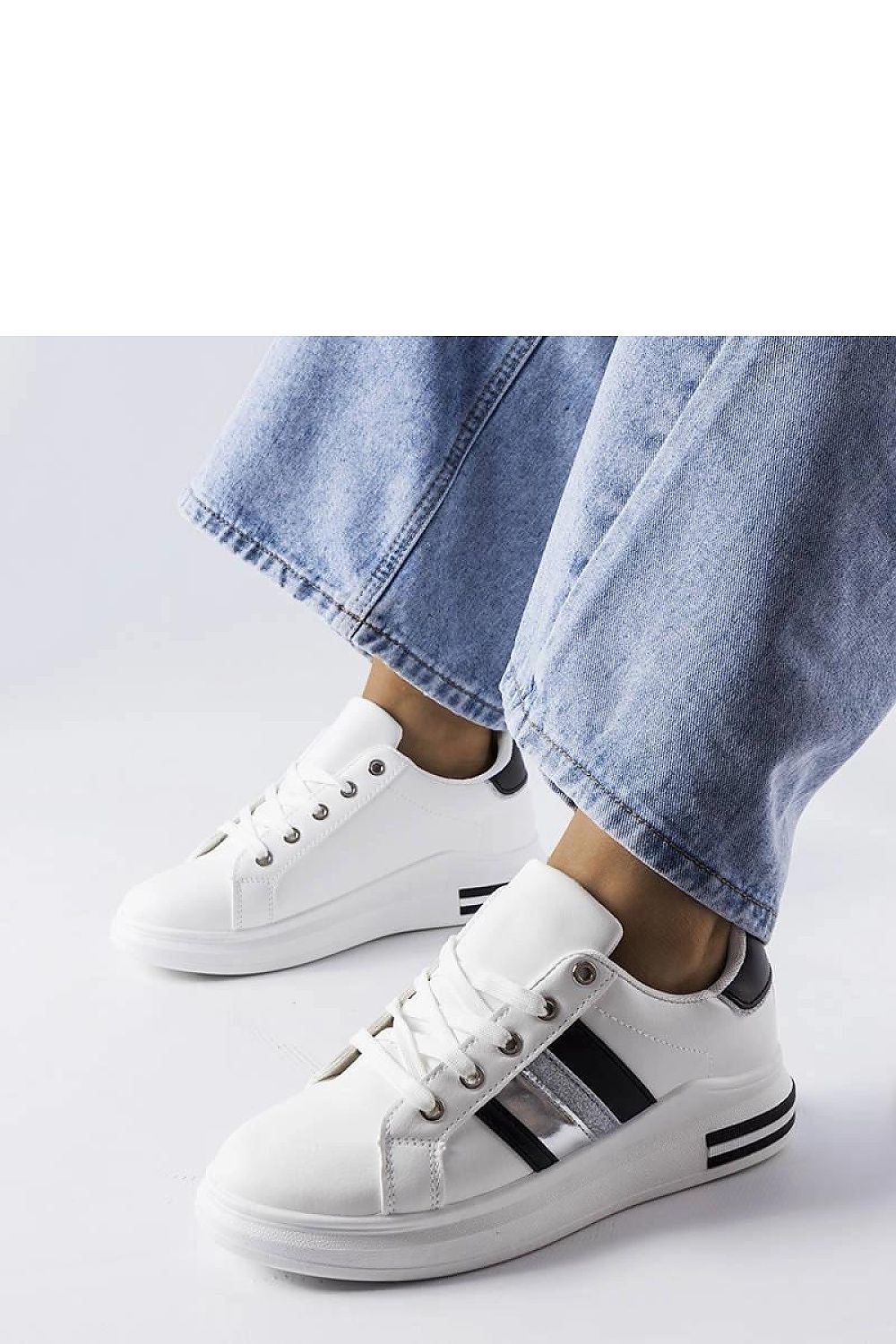 Solea Rhinestone Platform Sneakers fashionably paired with summer attire, illustrating the fusion of elegance and casual style.