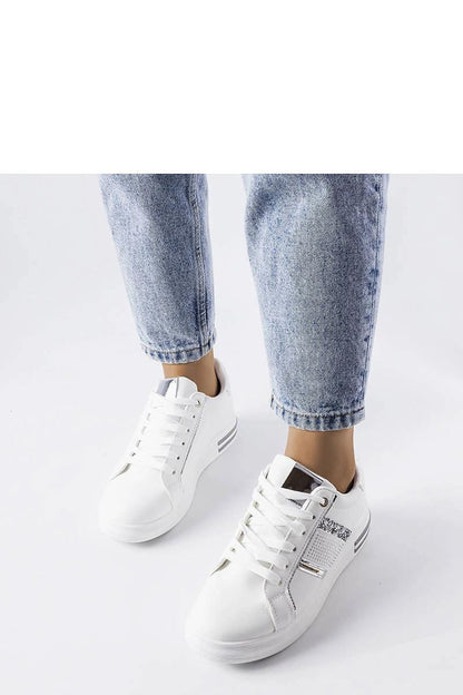 Close-up of Solea's rhinestone-studded beige sneakers, showcasing exquisite details and modern design for stylish women.