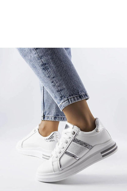 Trendy beige sneakers adorned with rhinestones by Solea, designed for fashionable women who appreciate elegance and comfort.