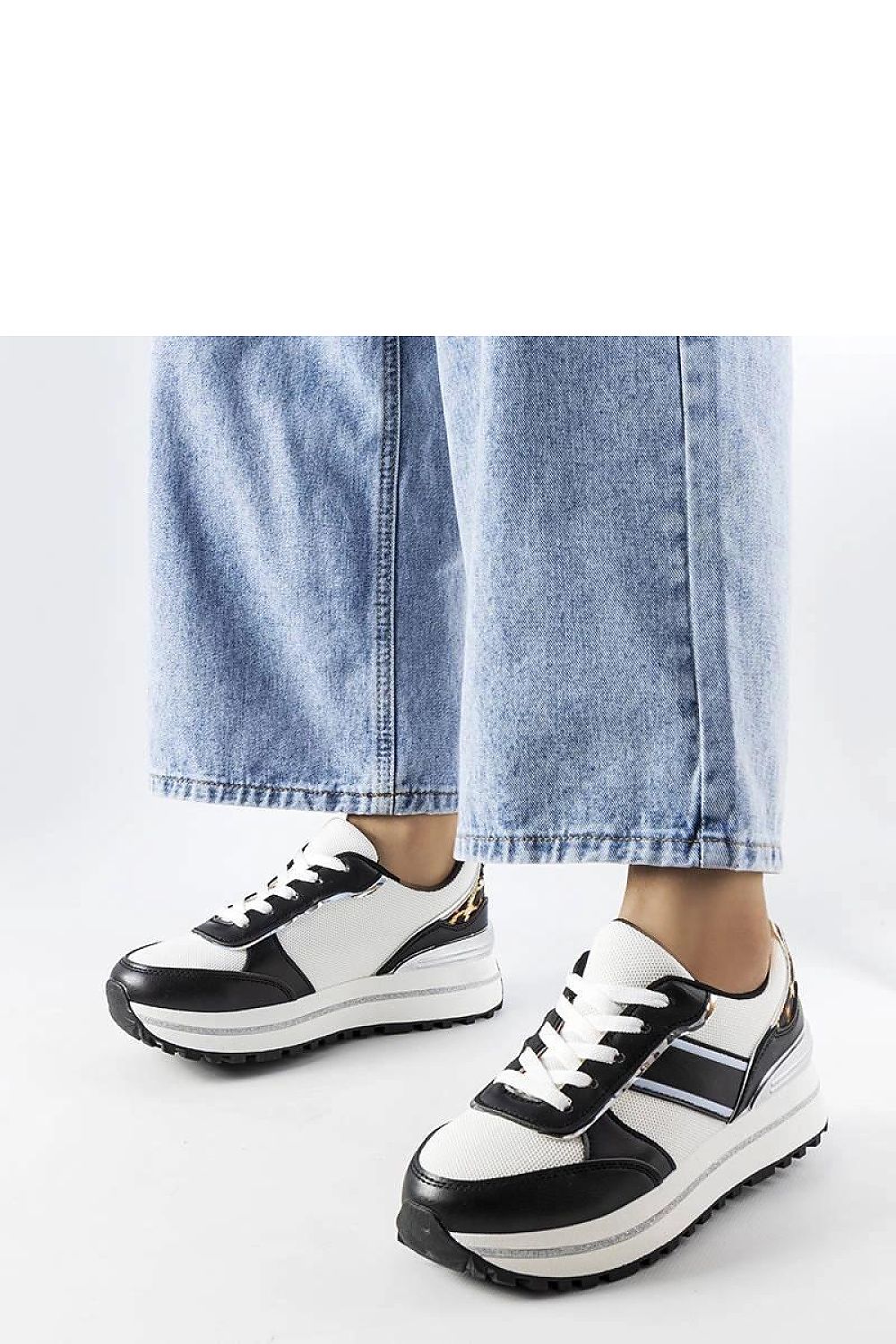 Solea luxury black sneakers with brocade detailing, ideal for chic summer walks and evening gatherings, providing a perfect blend of fashion and comfort.