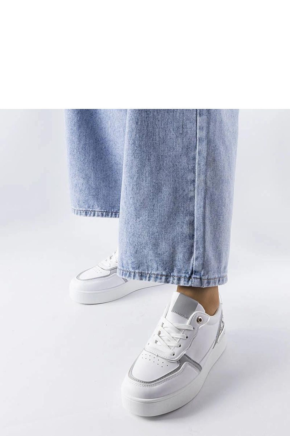 Chic Solea white lace-up platform sneakers showcasing a blend of comfort and luxury for women's fashion.