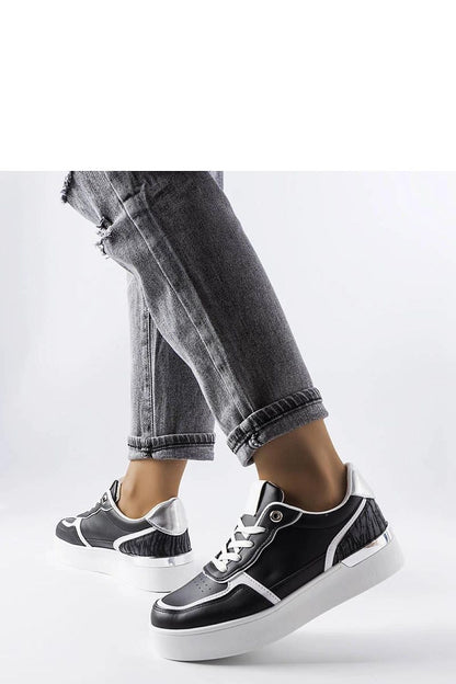 Close-up view of Solea white platform sneakers showcasing high-quality materials and lace-up closure for a comfortable fit.