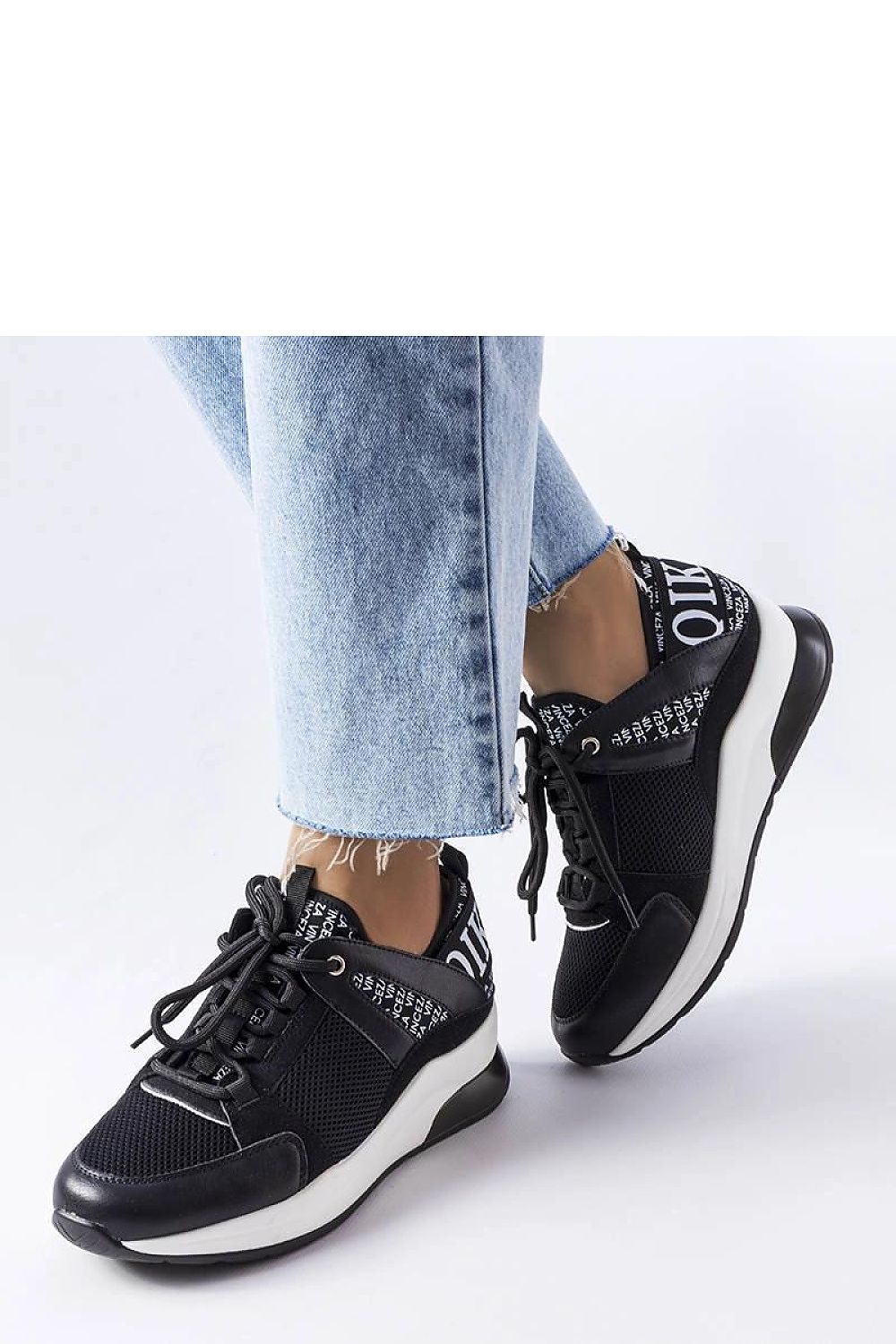 Solea vegan leather sneakers in chic black and white, featuring a trendy platform and minimalist design, perfect for stylish summer outfits.