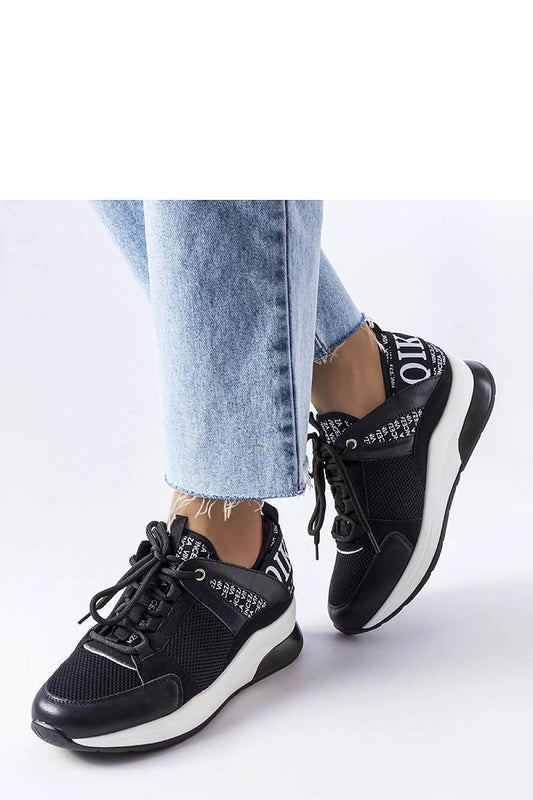 Solea vegan leather sneakers in chic black and white, featuring a trendy platform and minimalist design, perfect for stylish summer outfits.
